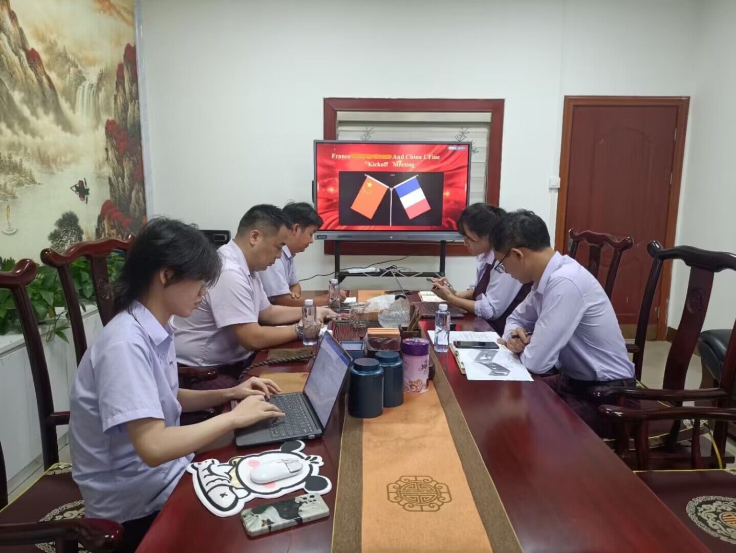 French clients visit our company through video conferencing